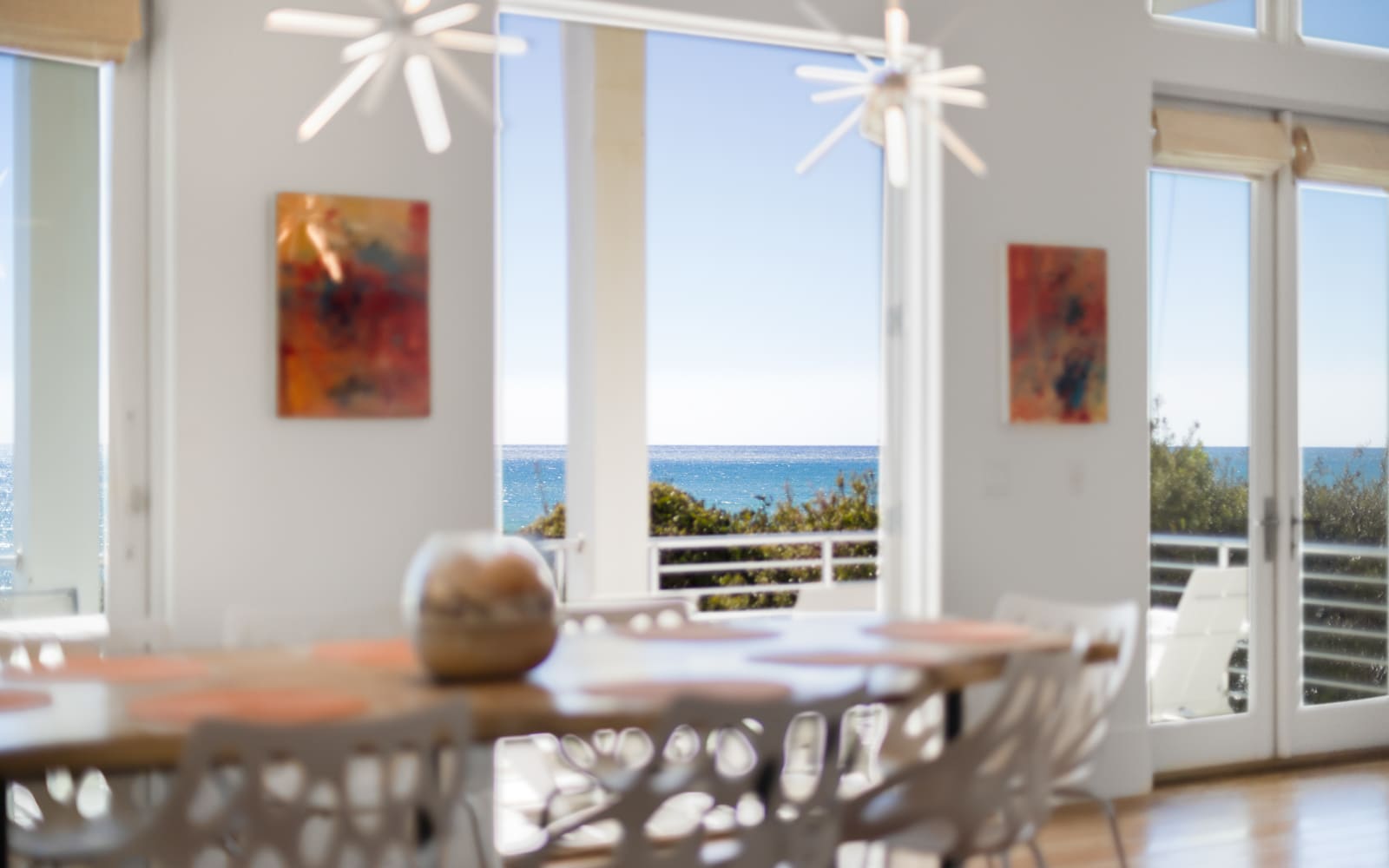 Watch the ocean sparkle from your dining table, where morning coffee and evening meals become unforgettable moments with endless blue views.