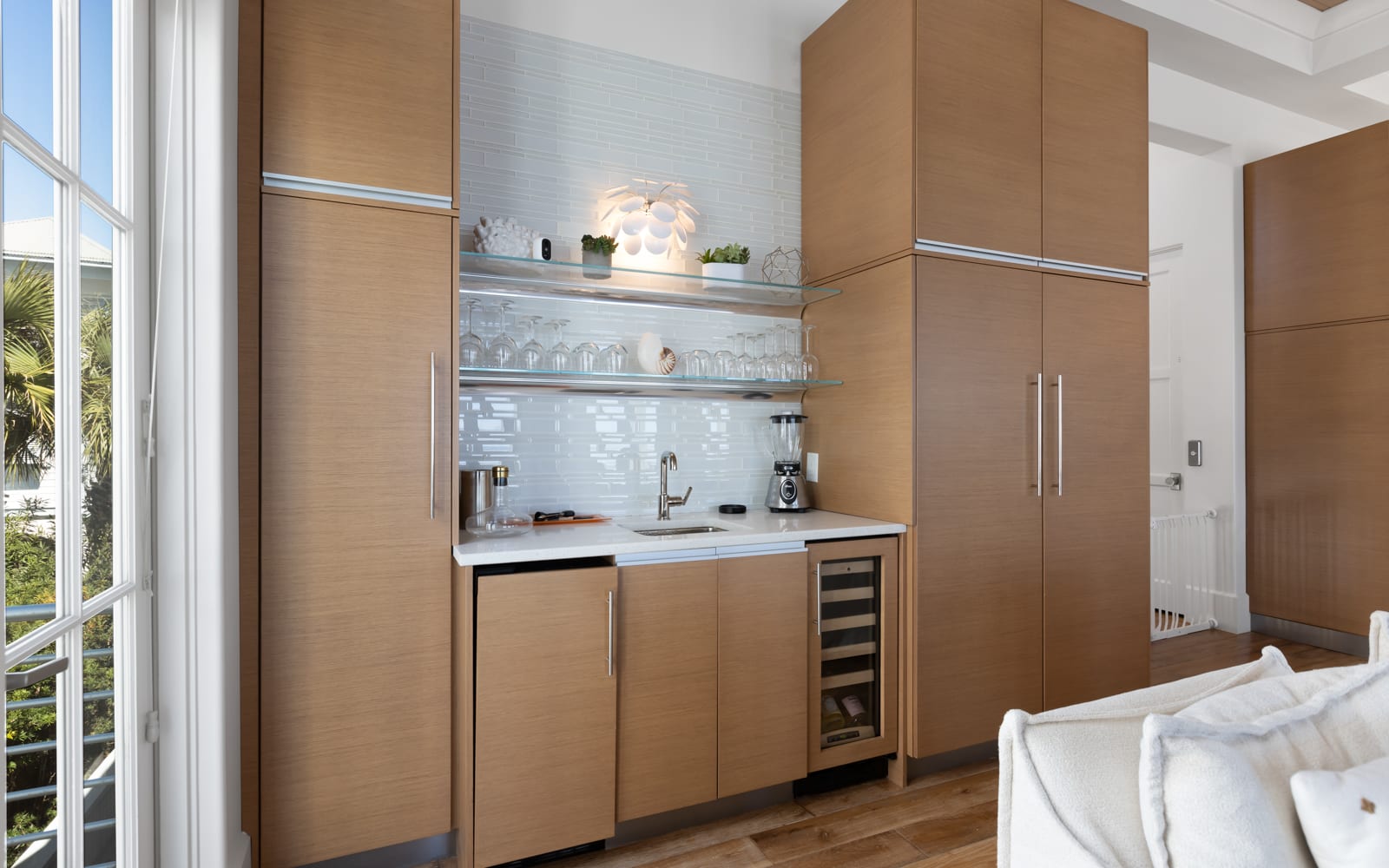 Your stylish kitchenette features sleek wood cabinetry, modern appliances, and gleaming countertops, perfect for preparing morning coffee or evening snacks.