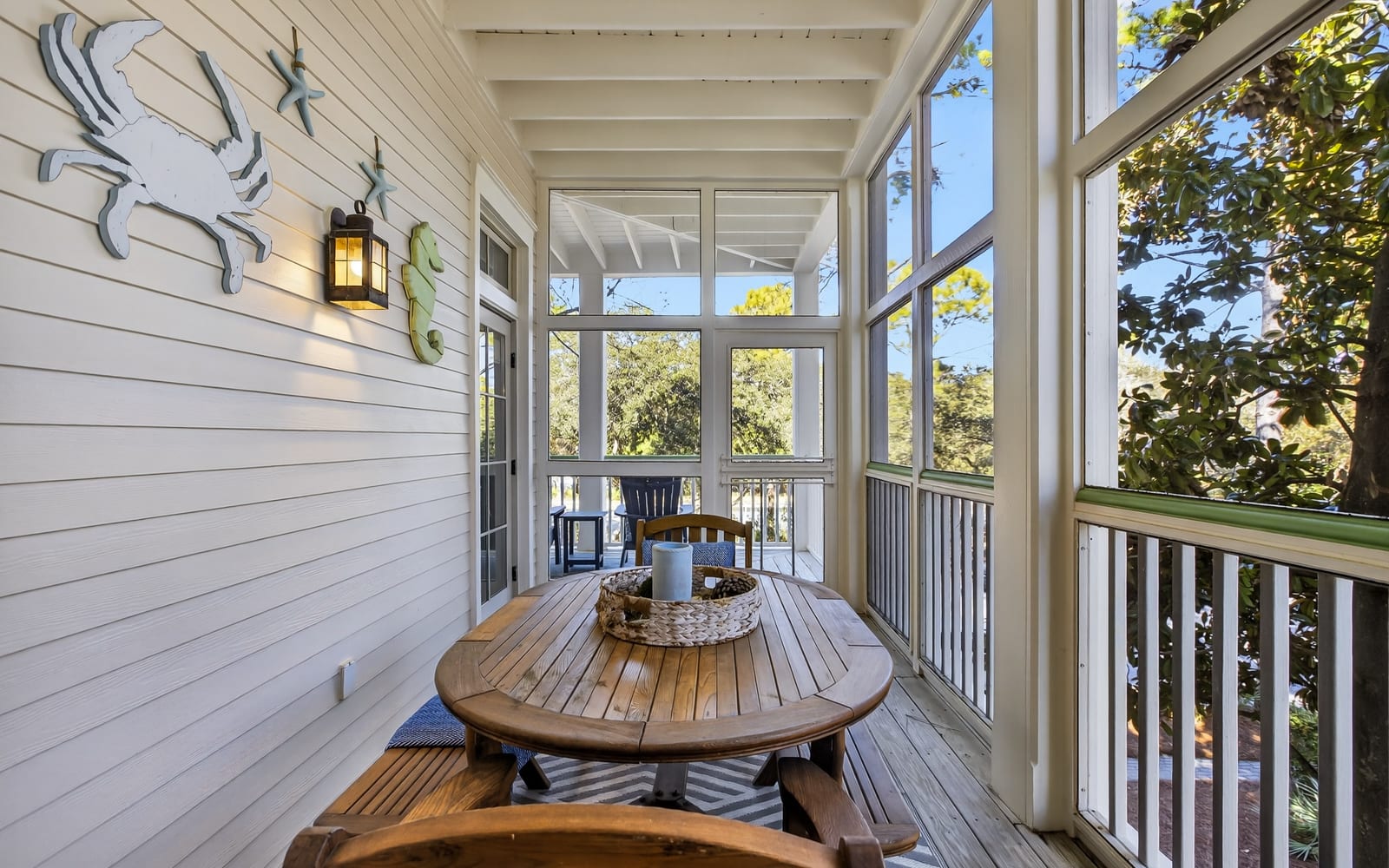 Your private screened porch offers peaceful dining with treetop views—perfect for morning coffee or evening meals surrounded by nature.