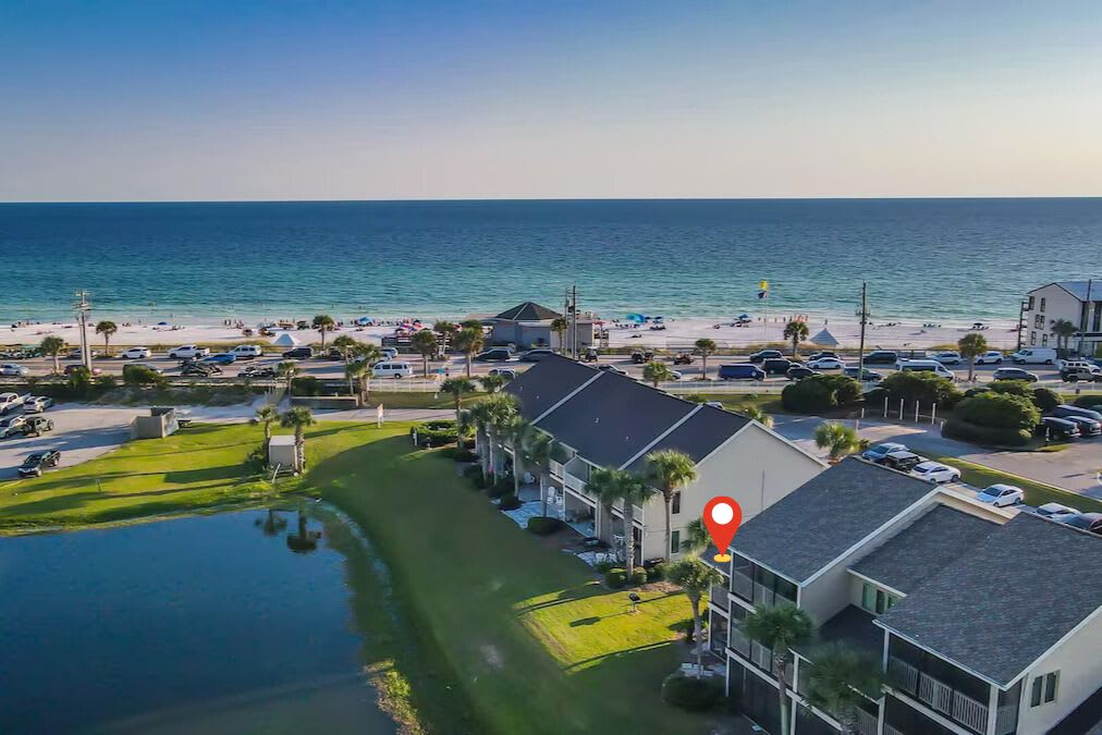 Lakefront villa just steps from the white sand beach! Enjoy the best of both worlds—tranquil water views and quick beach access right across the street.