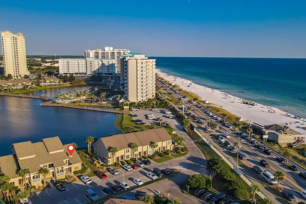 Prime location just steps from the beach! This lakefront villa sits across from the Gulf with easy access to white sand shores, dining, and shopping—all within walking distance.