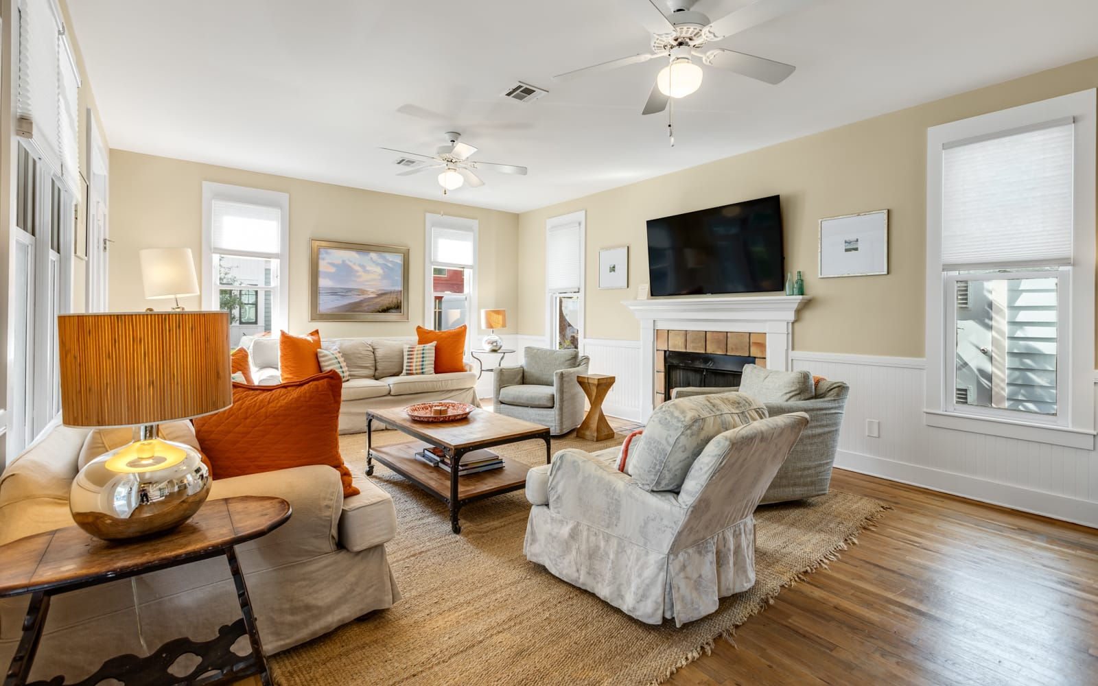 Unwind in your cozy living room with plush seating, warm fireplace, and entertainment center for perfect relaxation.