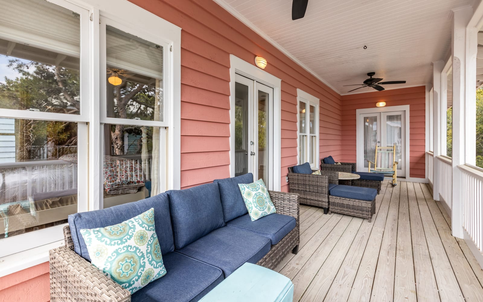 Relax on your private covered porch with comfy seating and coastal charm, perfect for morning coffee or evening conversations.