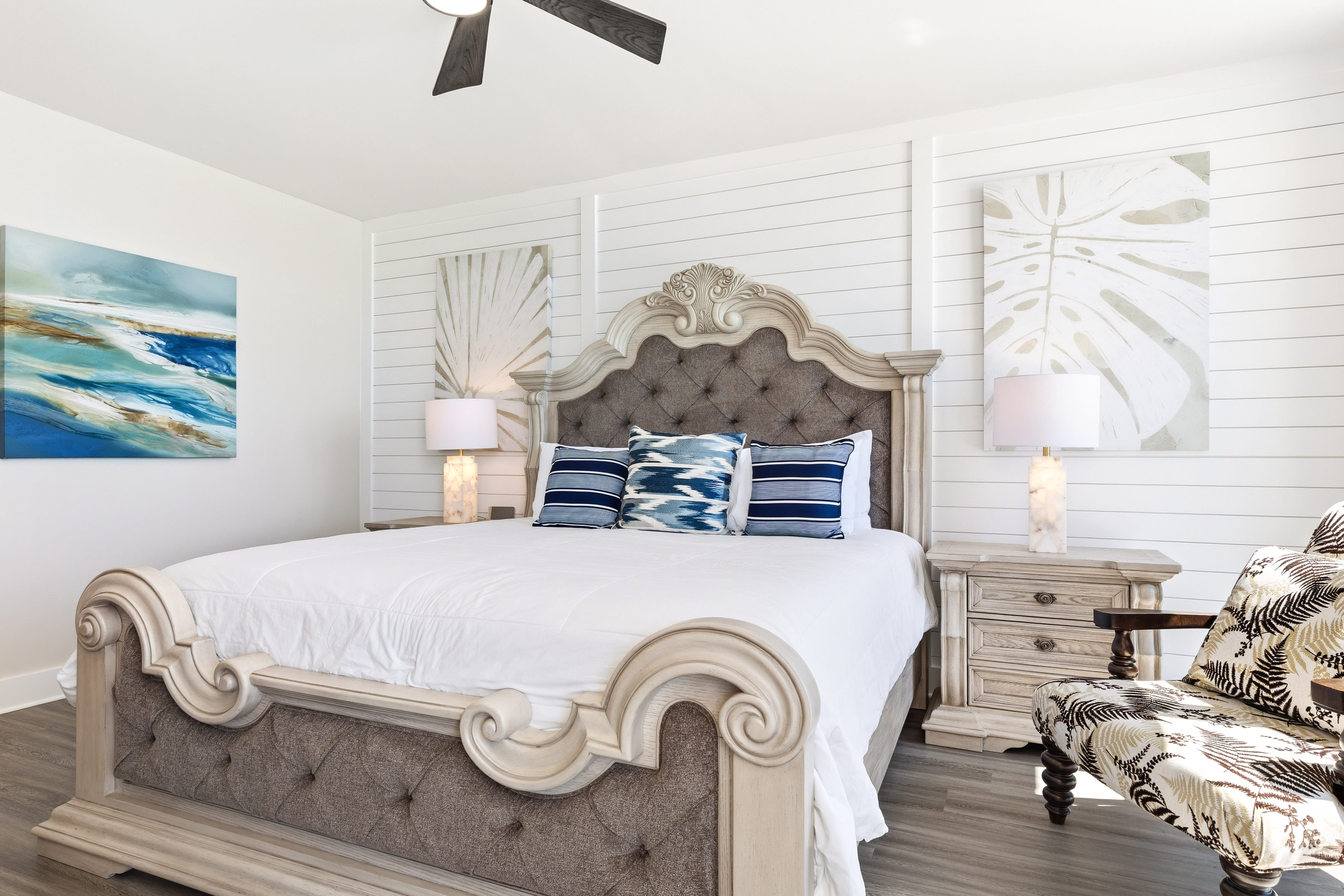 Drift off to sleep in your coastal retreat with soft linens and ocean-inspired artwork surrounding you.
