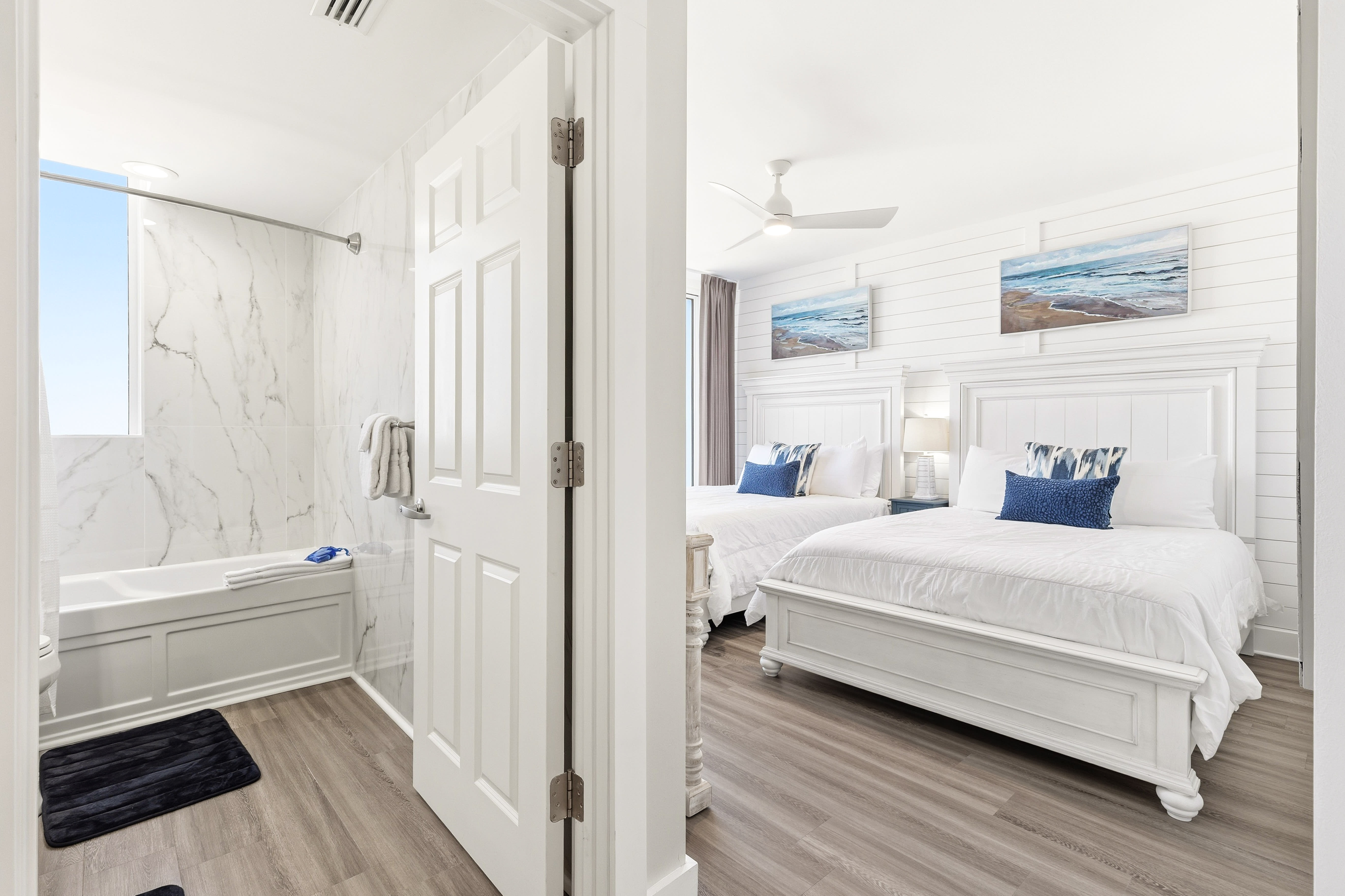 Unwind in your coastal-inspired bedroom with twin beds and crisp linens, plus an elegant marble bathroom for your comfort.