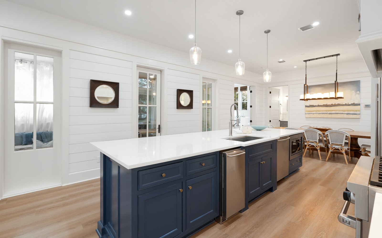 Your gourmet kitchen features pristine marble countertops and a spacious island perfect for preparing meals together.