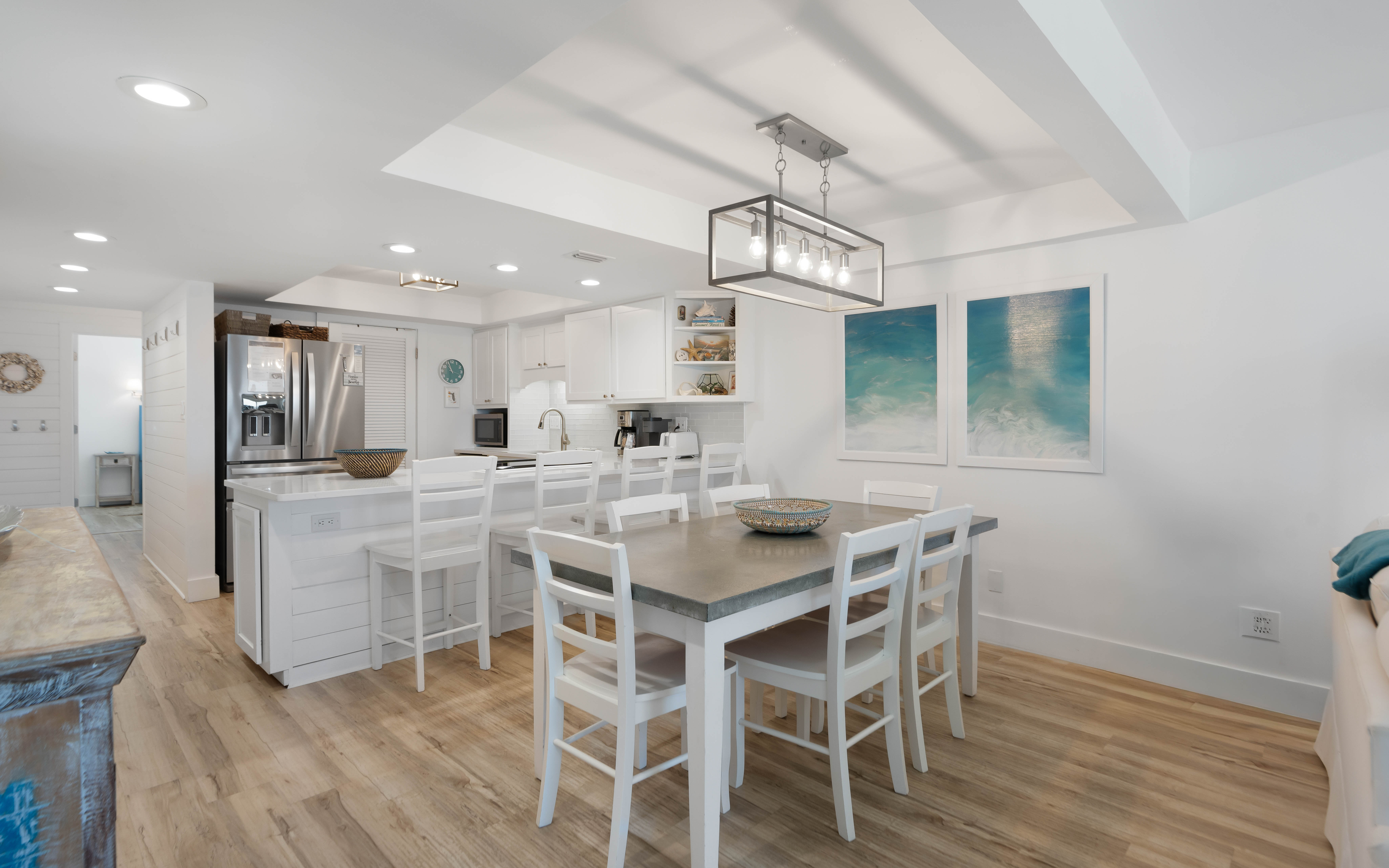You'll love cooking in this bright, modern kitchen with its spacious island and adjacent dining area—perfect for sharing meals together.