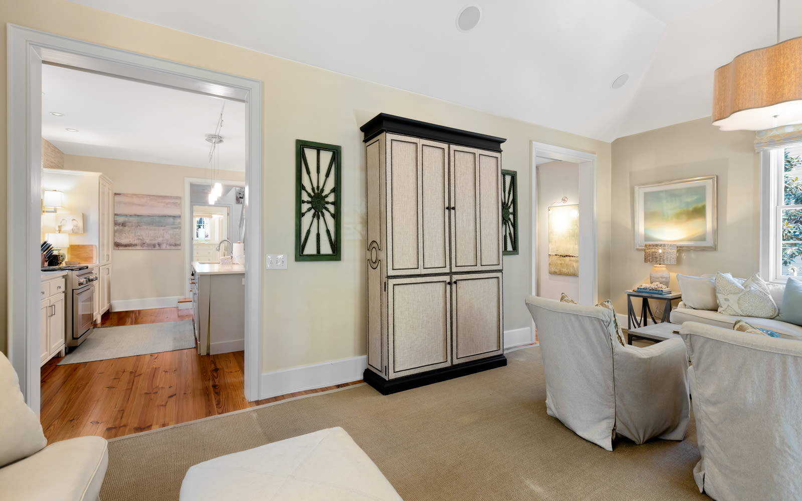 Your spacious living area flows seamlessly into the modern kitchen, creating the perfect open space for relaxing and entertaining.