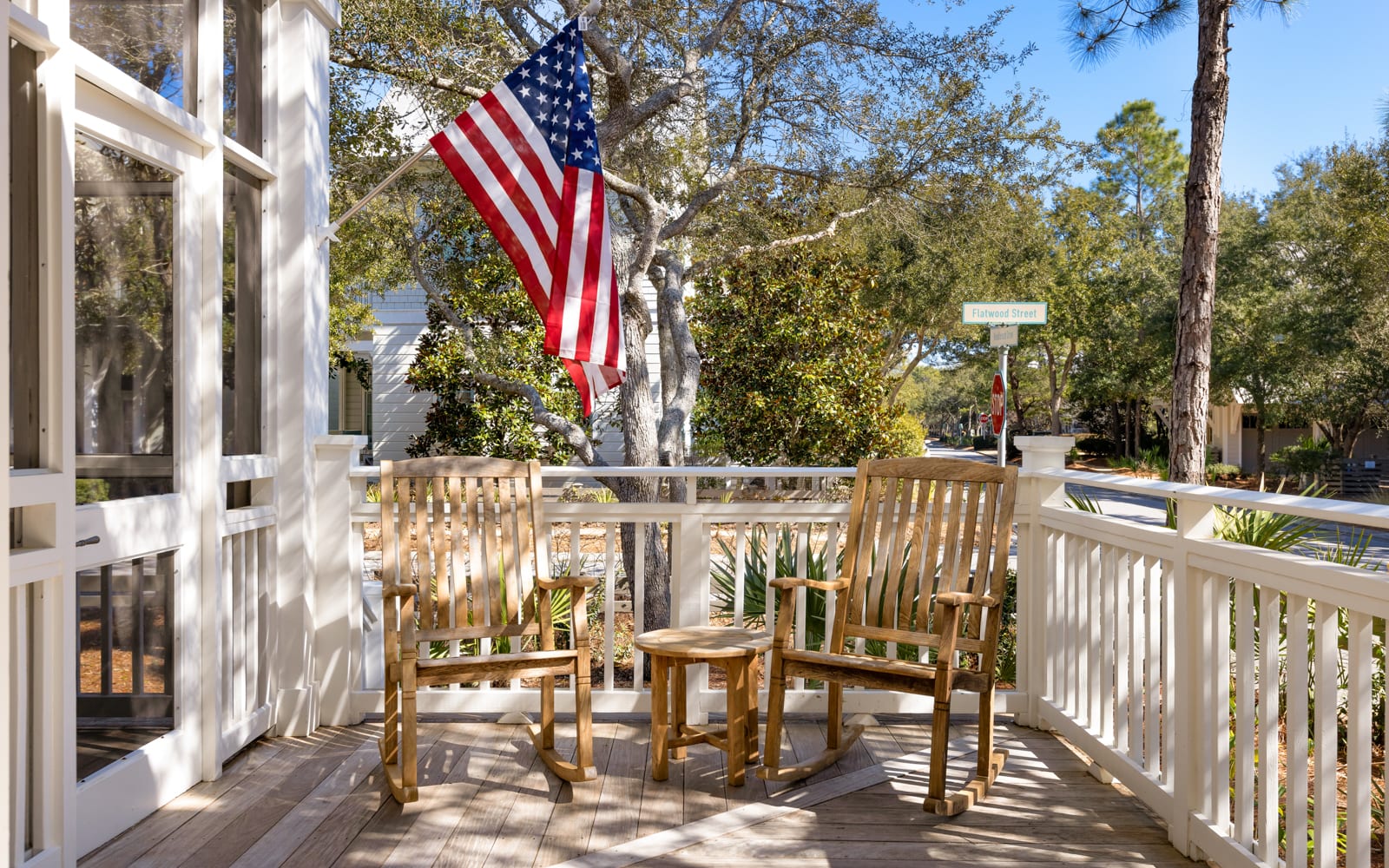 Your private deck offers peaceful moments with rocking chairs and patriotic charm, perfect for morning coffee or evening relaxation.