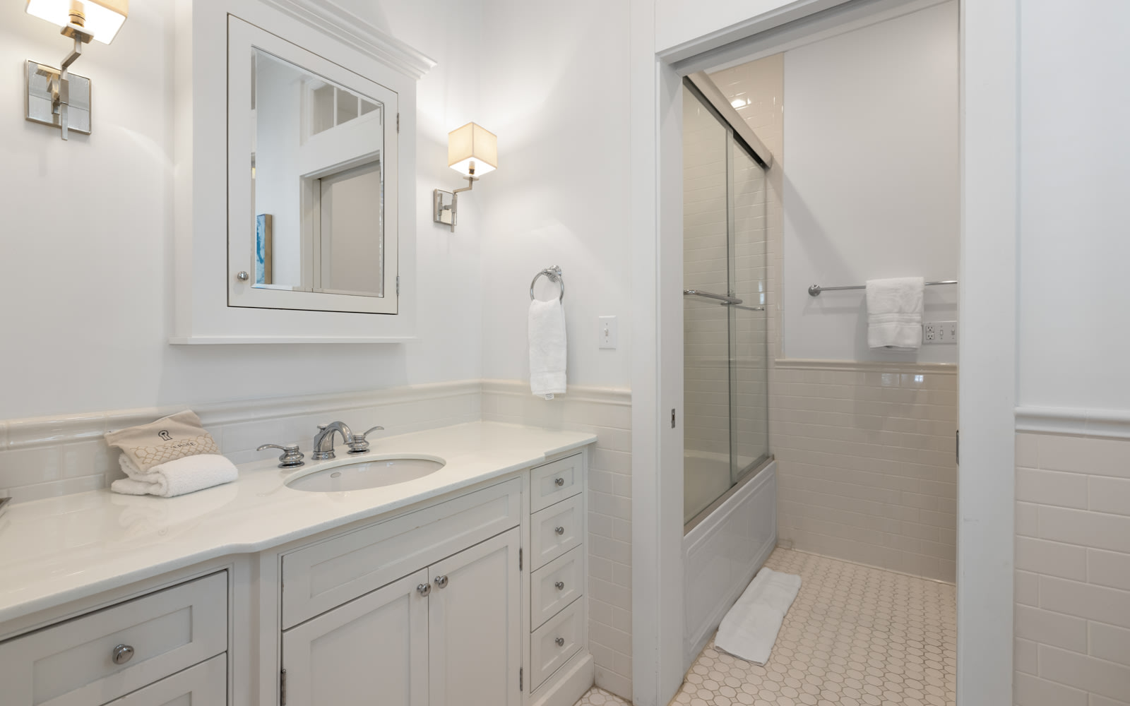 Step into your spa-like ensuite where marble countertops and soft lighting create a serene sanctuary for your morning routine.