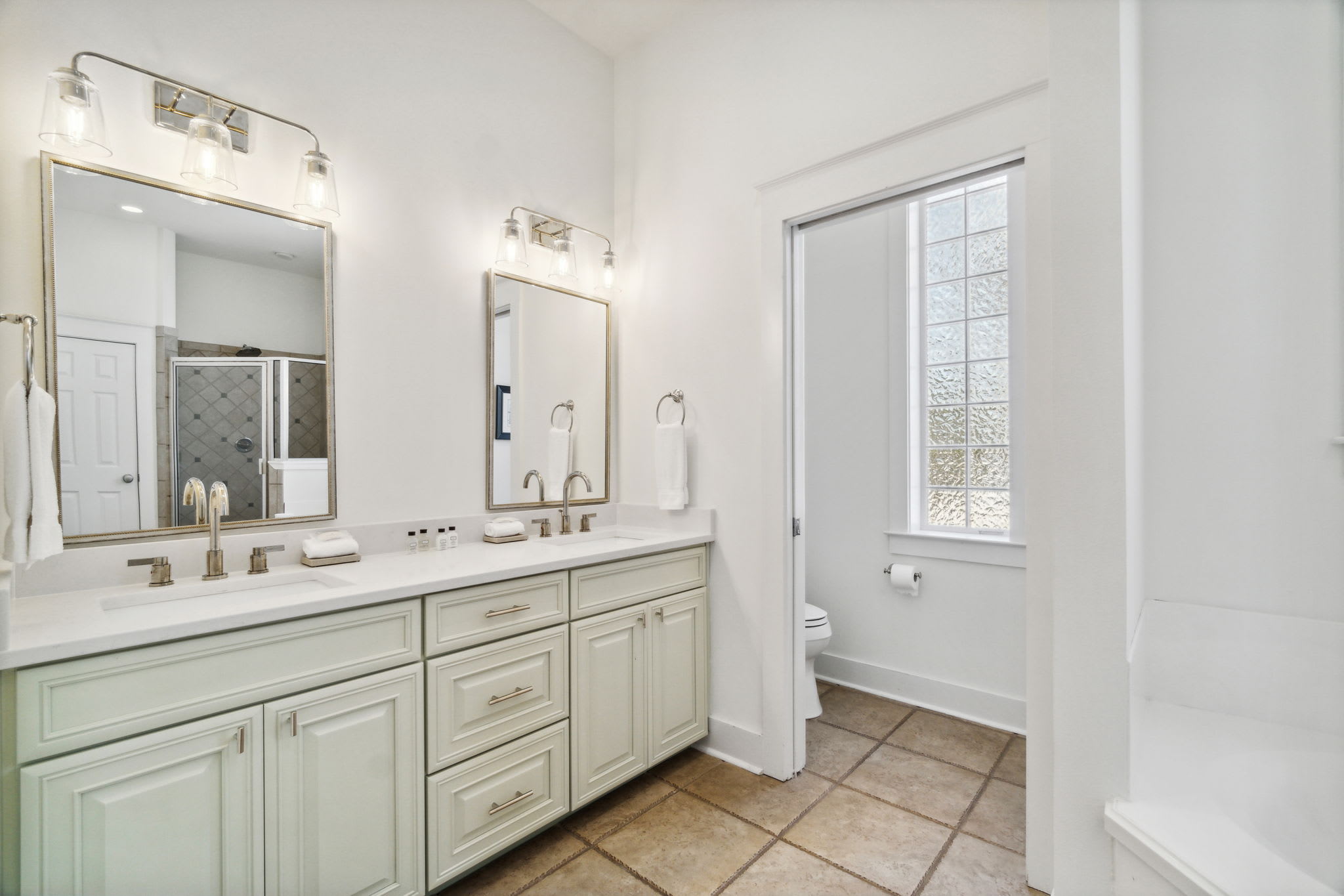 2nd Floor Primary Ensuite - Featuring a Soaking Tub and Walk-in Shower