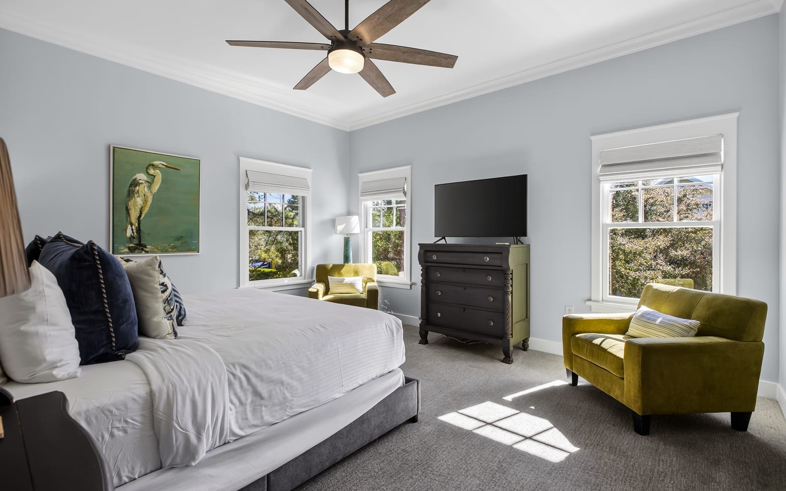 Sink into plush bedding while natural light streams through your windows, creating the perfect retreat for restful nights and peaceful mornings.