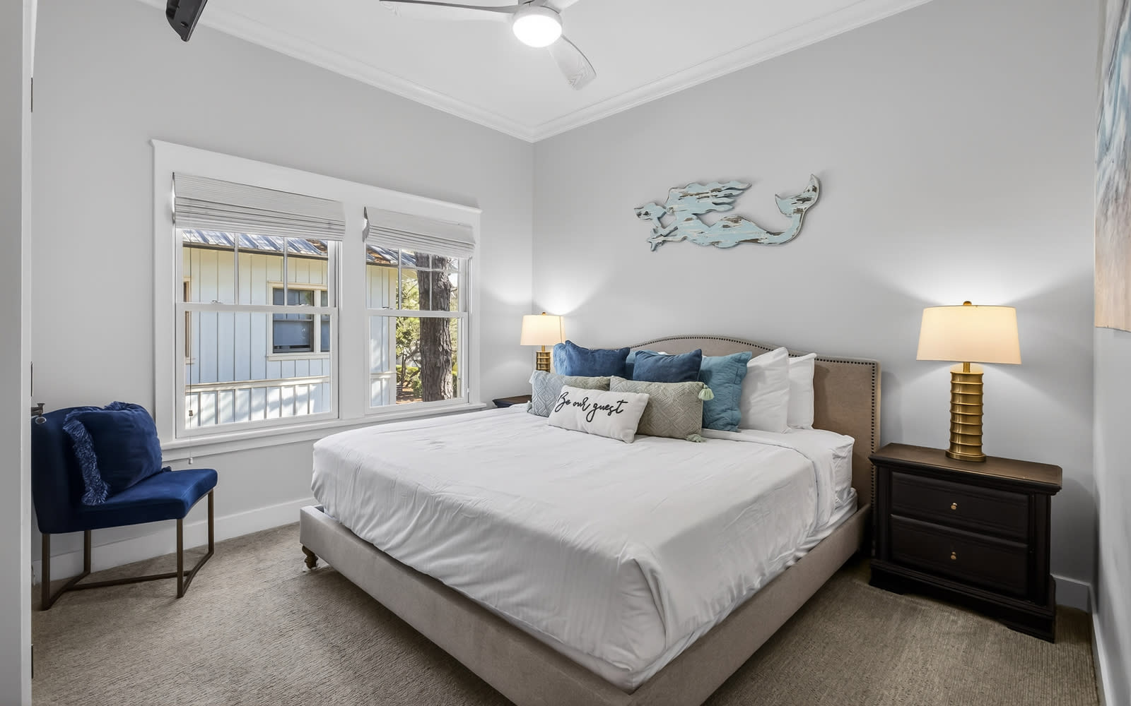 Sink into plush comfort in your serene bedroom retreat, where coastal touches and soft linens create the perfect sanctuary for restful nights.