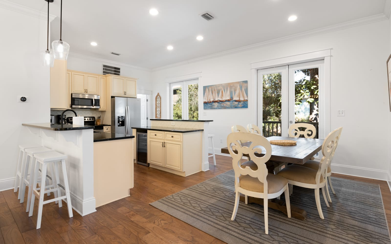 Your spacious open kitchen flows seamlessly into the dining area, where you'll love preparing meals and gathering around the elegant table.