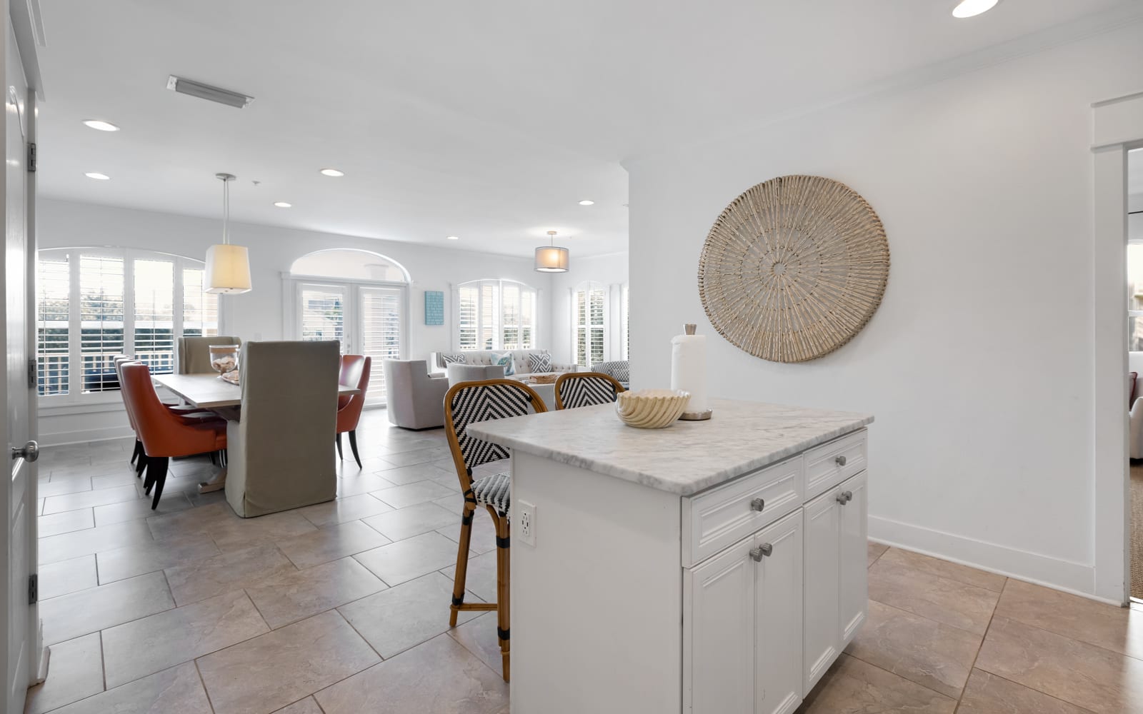 Unwind in your bright, open-concept space where natural light floods through stunning windows, creating the perfect backdrop for memorable meals.