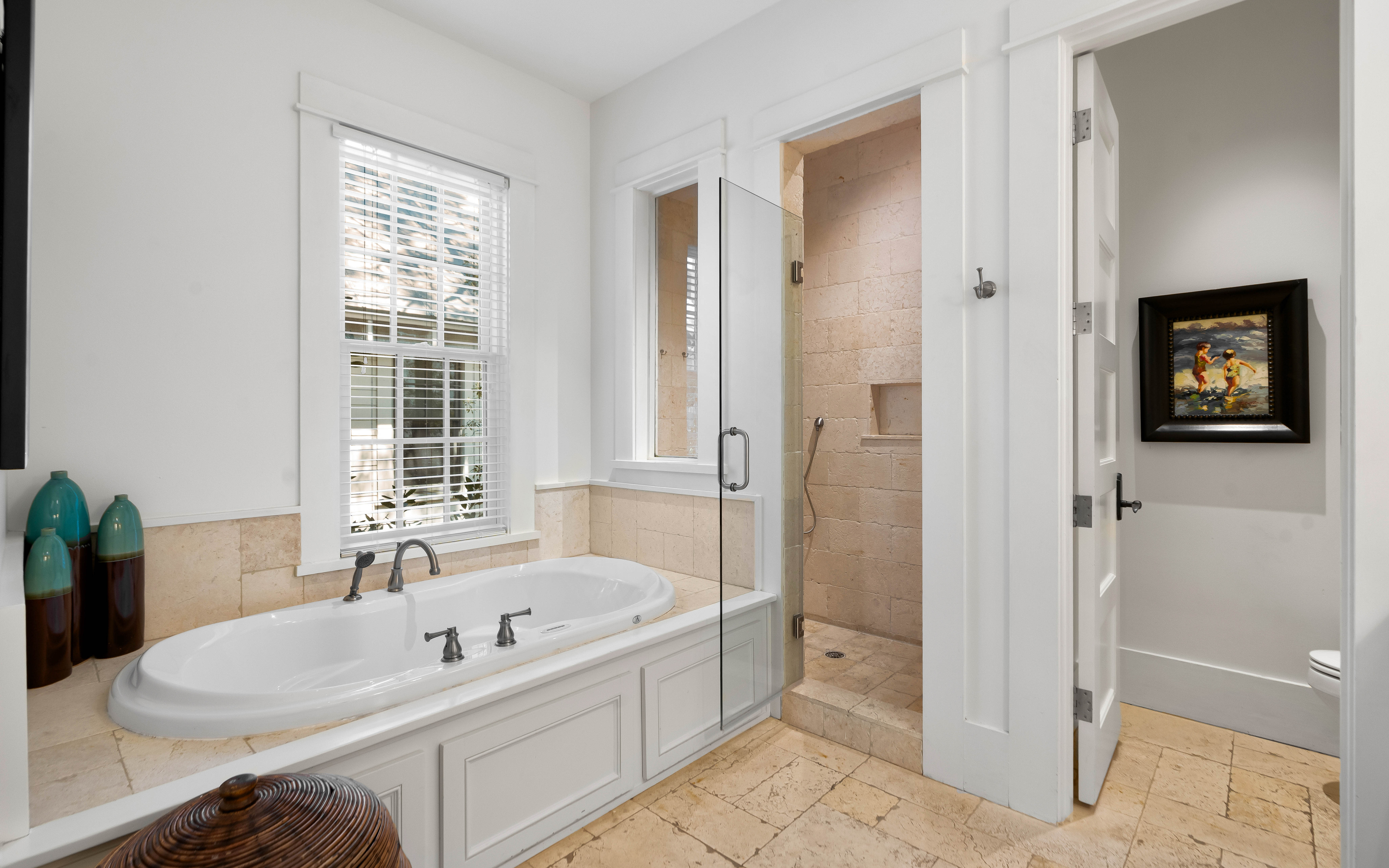 Luxurious master bath features a deep soaking tub and spacious walk-in shower for your ultimate relaxation.