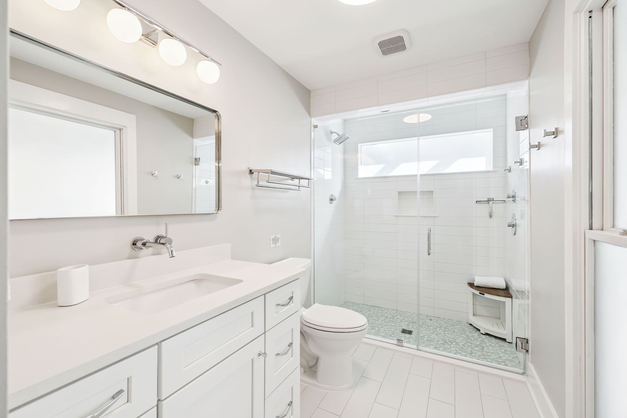 Primary King En-Suite - Single Vanity + Walk-In Shower