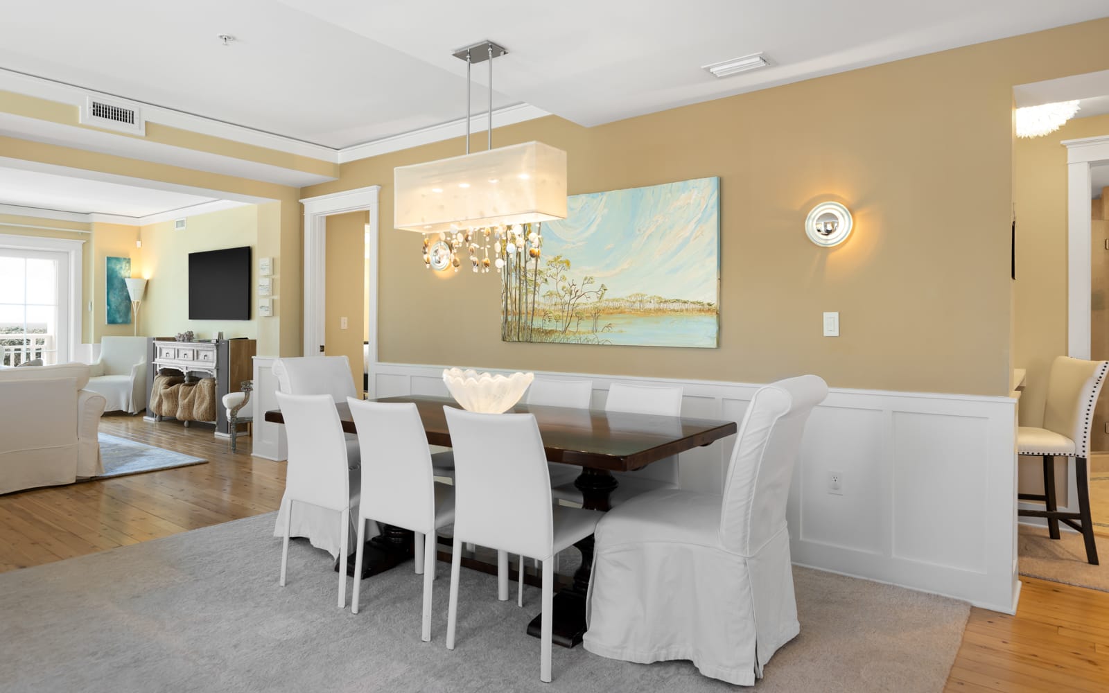 Your elegant dining room awaits with seating for eight, perfect for memorable meals together.