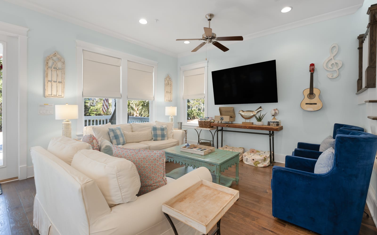 Sink into plush seating while coastal breezes flow through your bright living space, complete with entertainment and charming nautical touches.