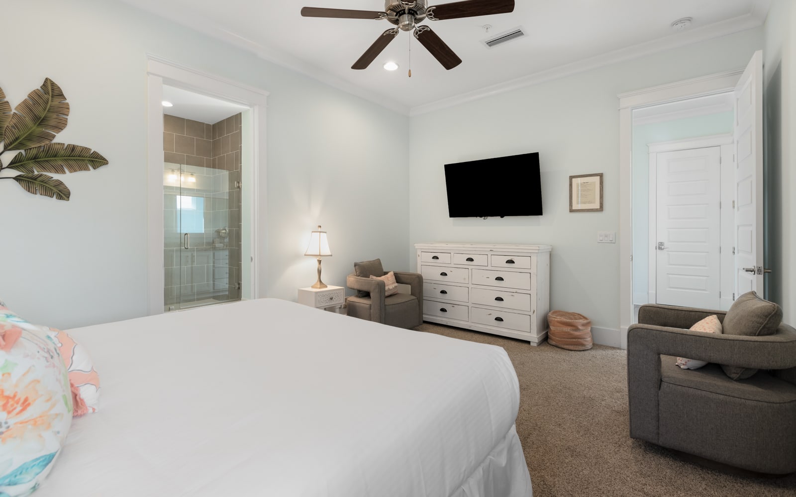 Your spacious master bedroom features a cozy seating area and private ensuite bathroom for ultimate comfort and relaxation.