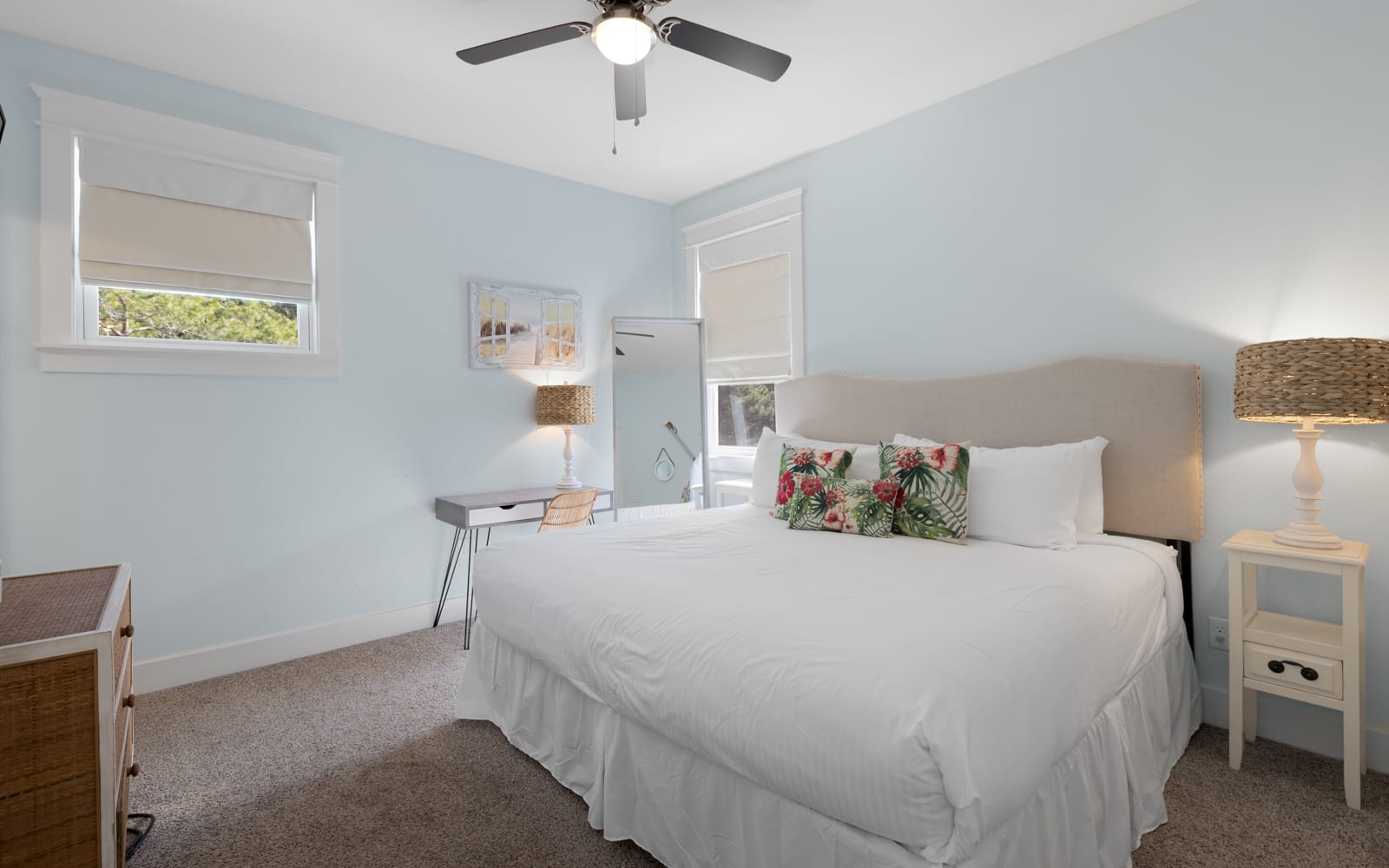 Rest peacefully in your serene bedroom with soft blue walls, crisp white linens, and natural light streaming through your windows.