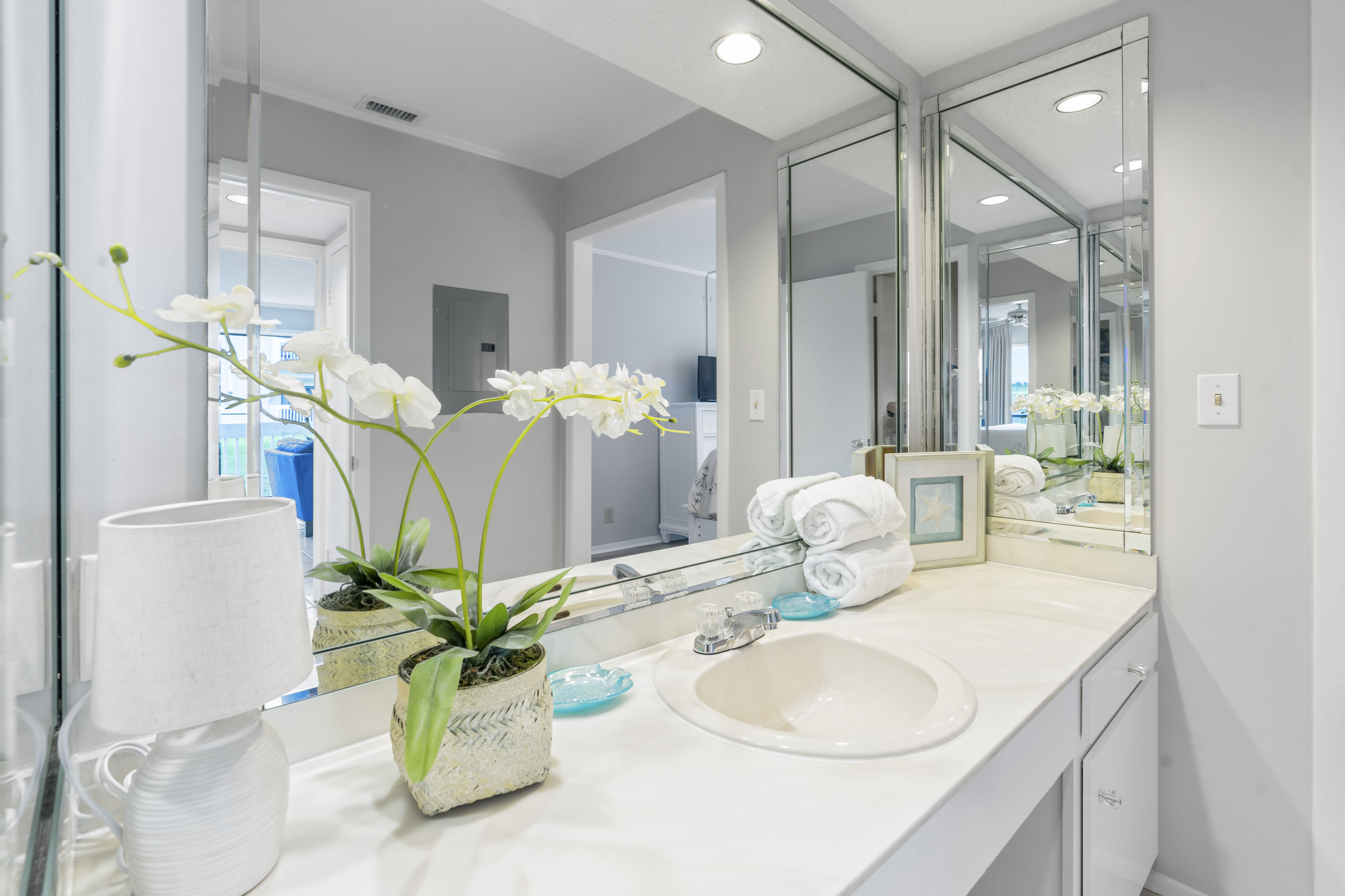 Bathroom with a sink and mirror.