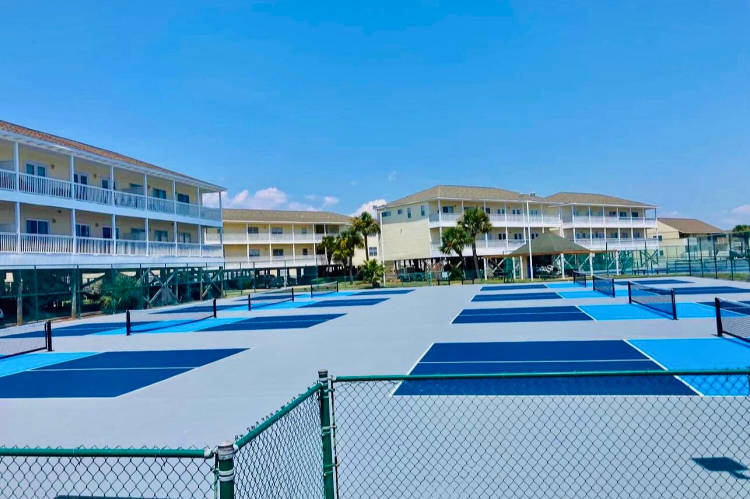 Pickleball courts at Sandpiper Cove Resort offering a fun, active way to enjoy the coastal sunshine, with well-maintained courts and a relaxed resort atmosphere perfect for all skill levels.