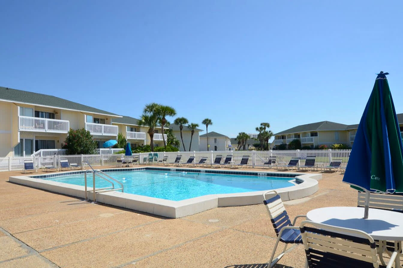 One of five sparkling community pools at Sandpiper Cove Resort, offering a refreshing place to cool off, relax poolside, and enjoy sunny Destin days in a peaceful resort setting.