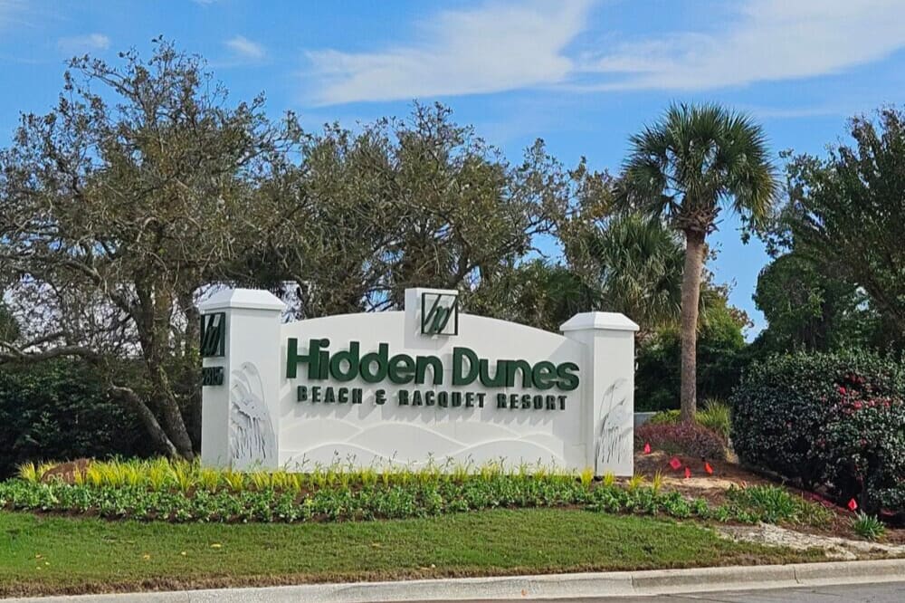 Welcome to Hidden Dunes, a gated beachside resort known for its lush grounds, tennis courts, and charm.