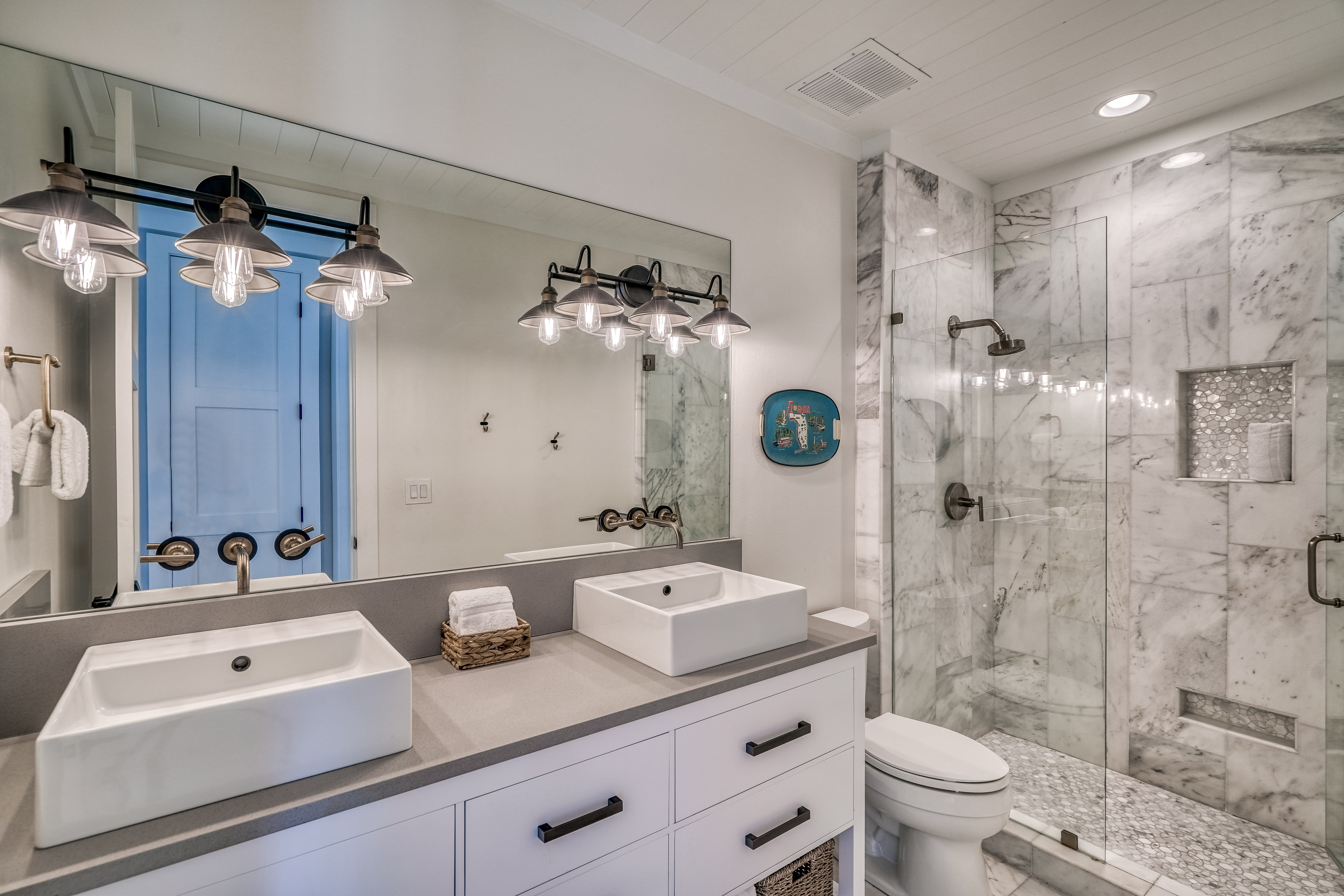 1st Floor Guest Bathroom - Featuring a Walk-in Shower and Dual Vanity
