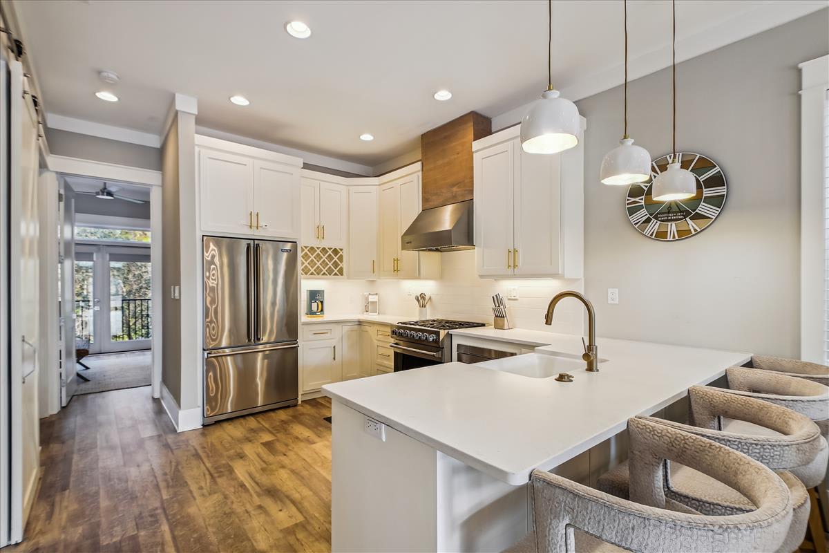 Updated Kitchen with Ample Counter Space and Bar Seating