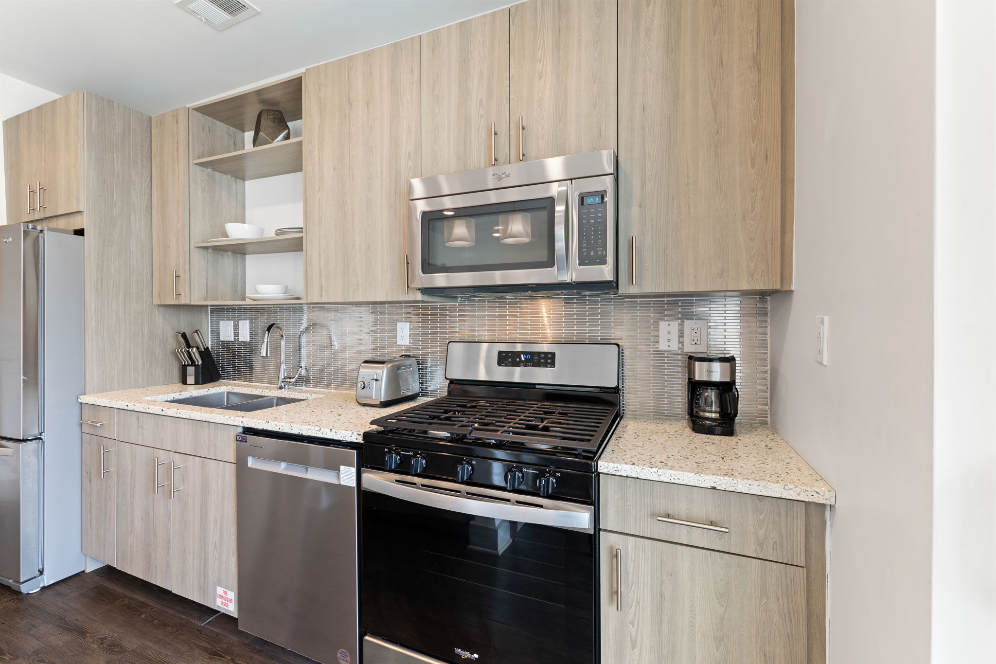 Well Equipped Kitchen with Stainless Steel Appliances