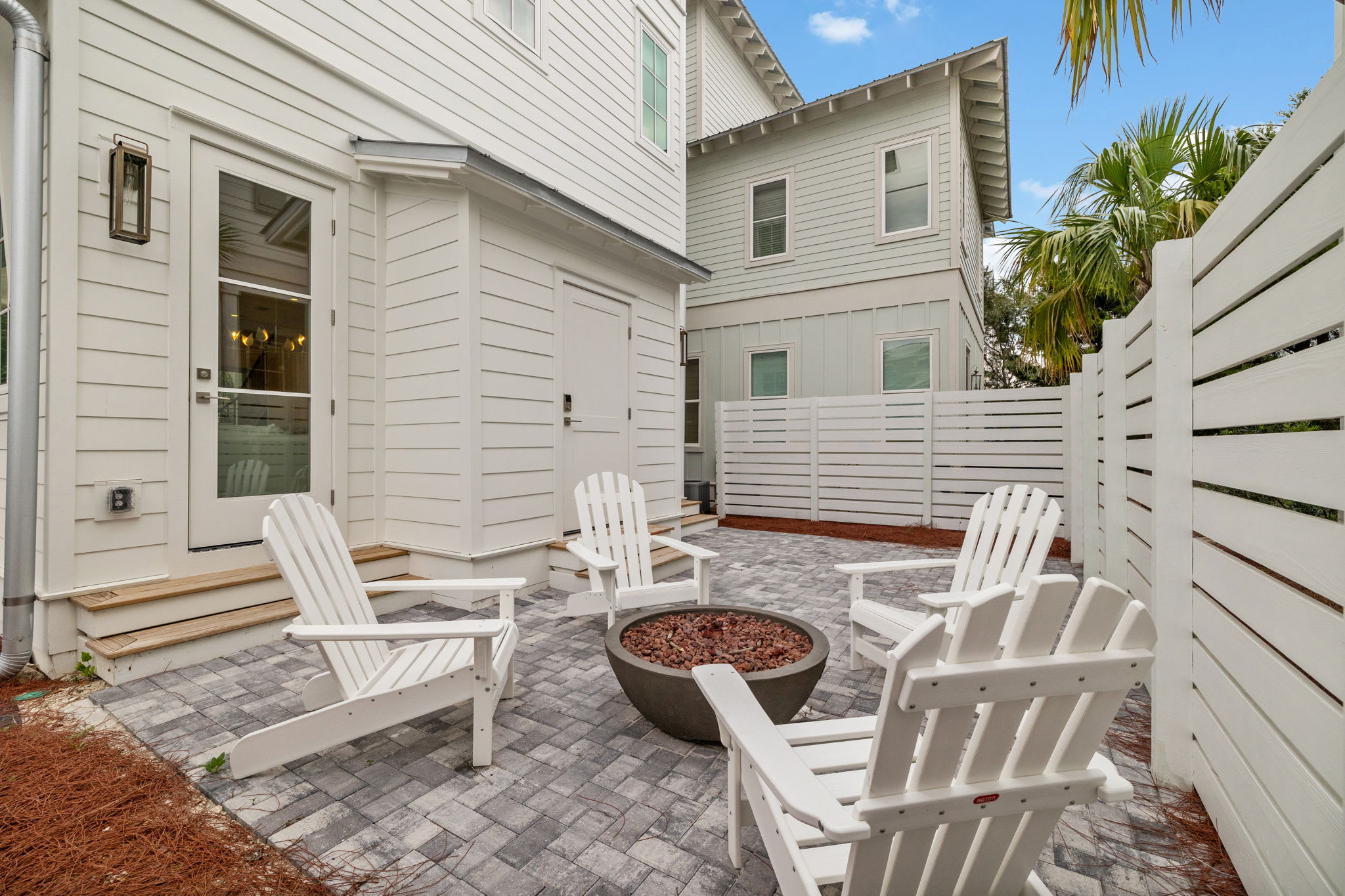 Make Your Way to the Back Patio for an Evening by the Fire!