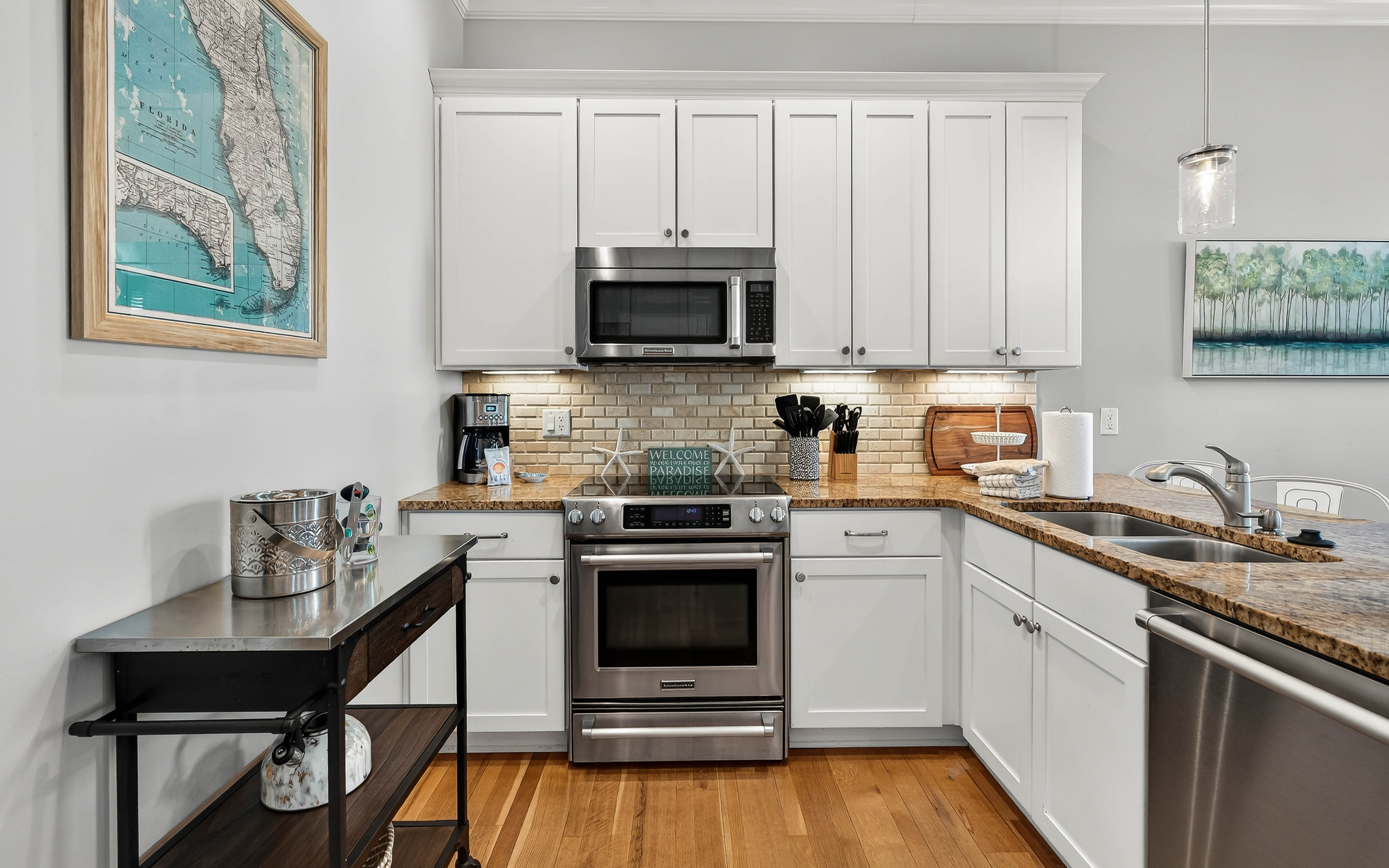 Your fully equipped kitchen awaits with granite countertops, stainless appliances, and everything needed for memorable meals together.