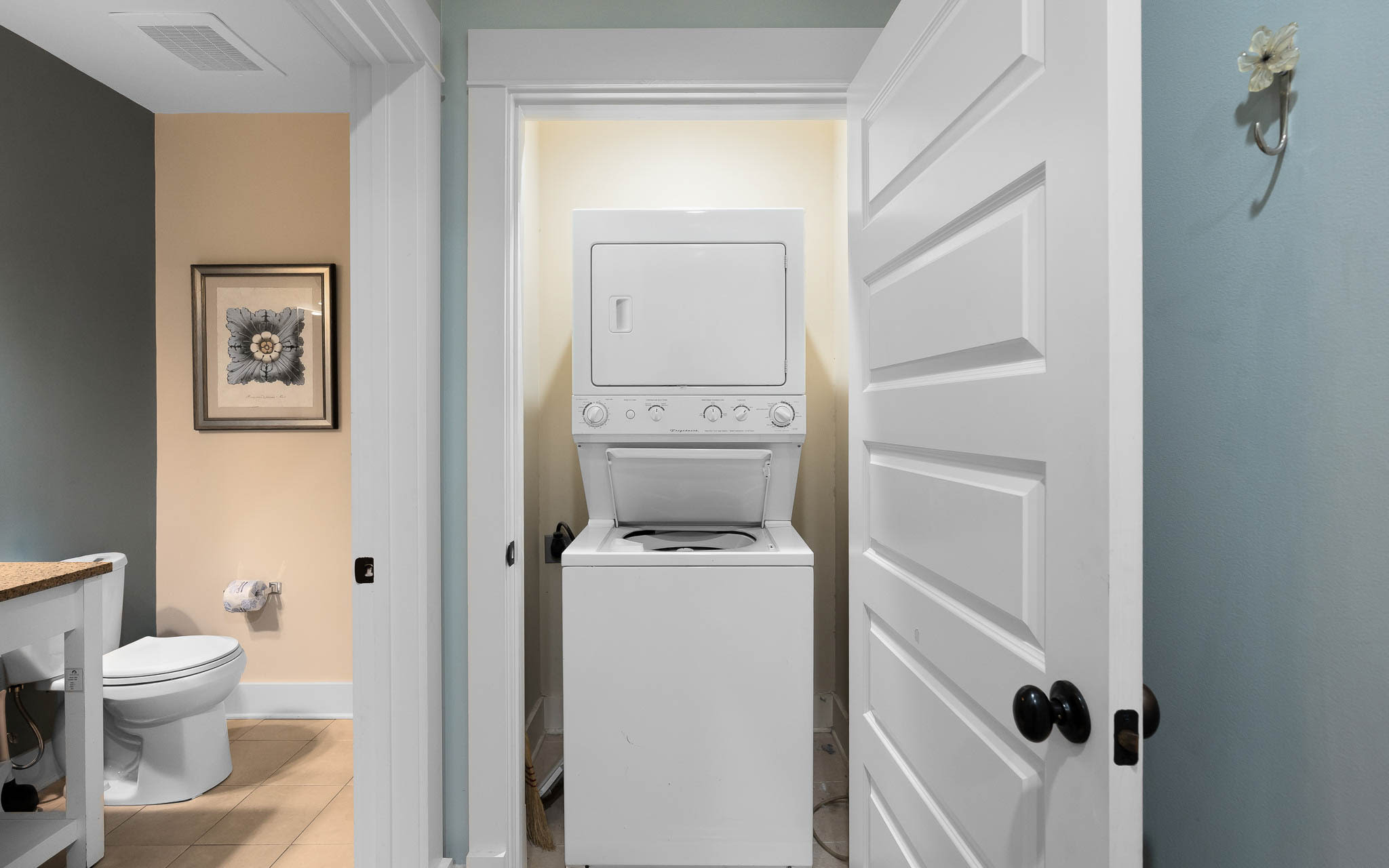 Your in-unit washer and dryer make extended stays effortless, tucked conveniently in a dedicated closet next to the bathroom.