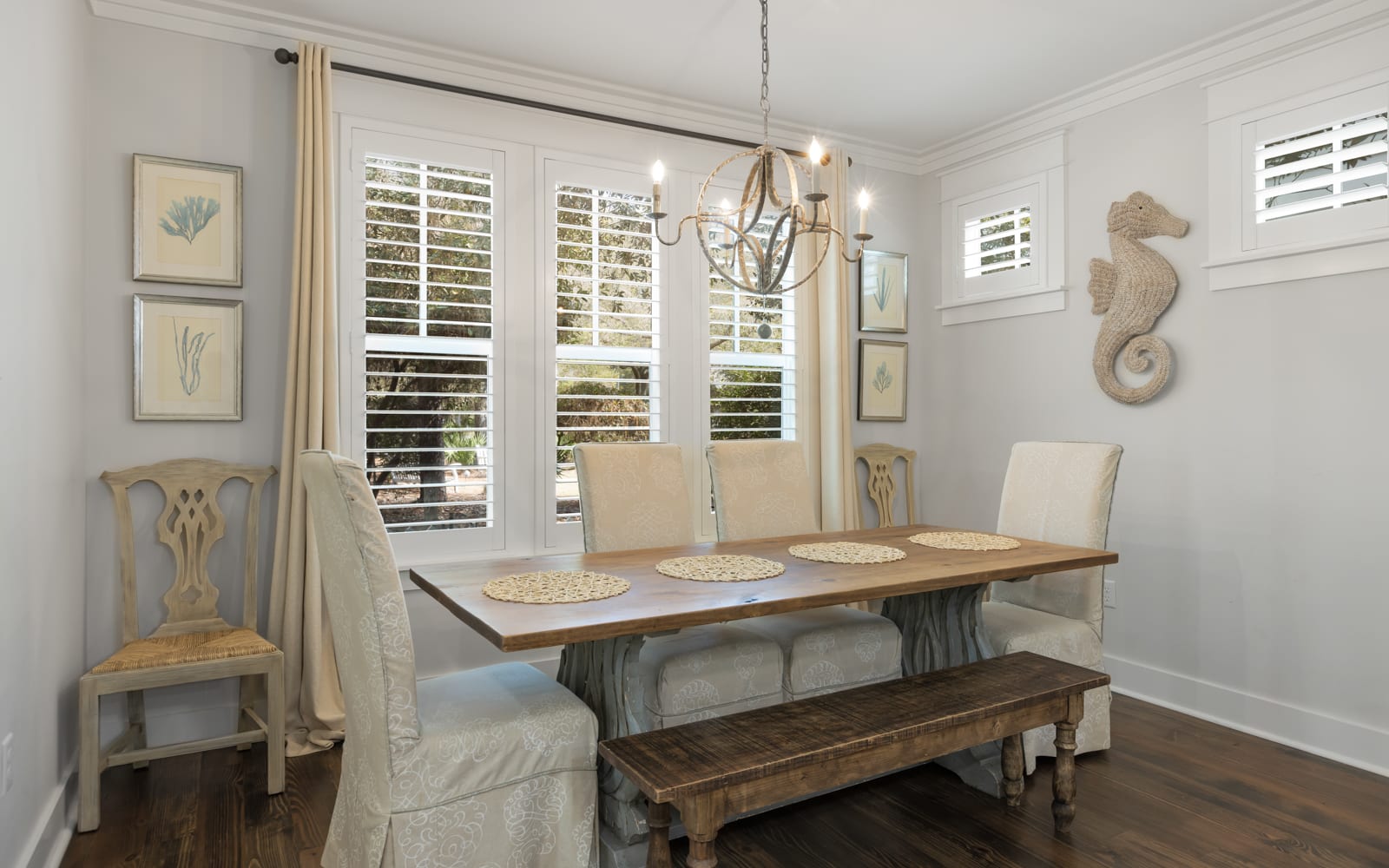 Gather around your elegant dining table where coastal charm meets comfort, perfect for memorable meals with loved ones.