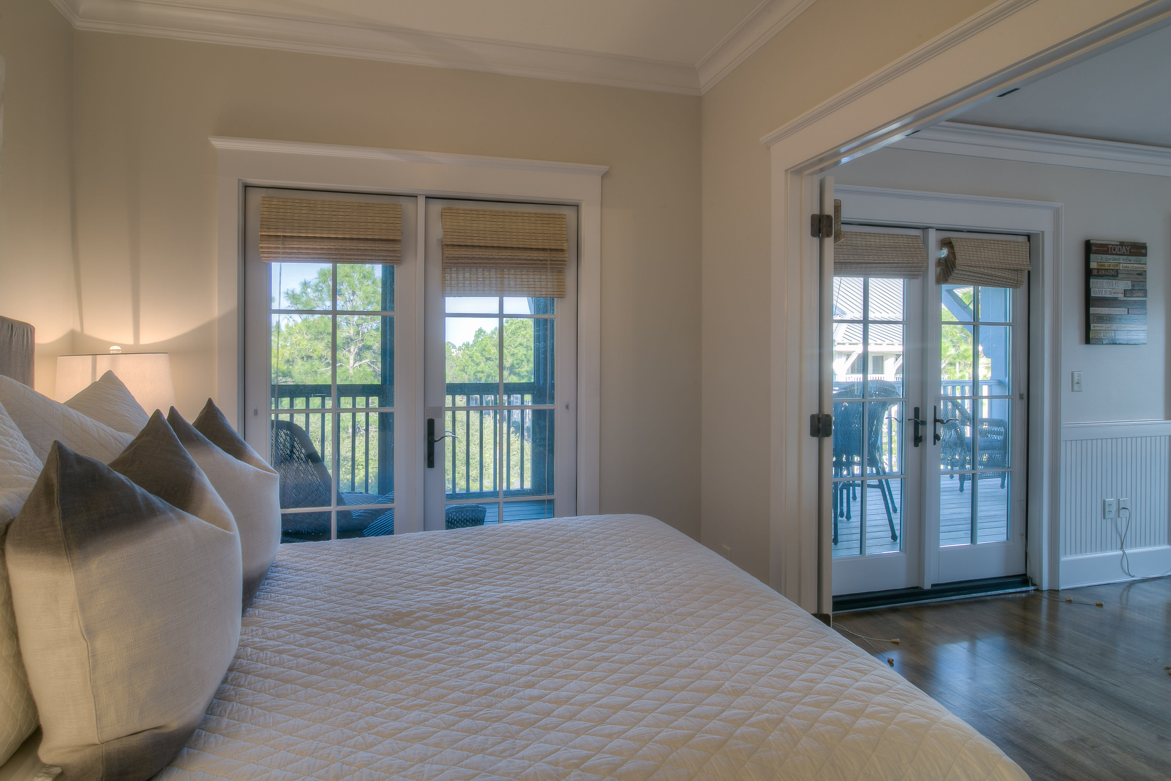 Doors lead to screened-in balcony