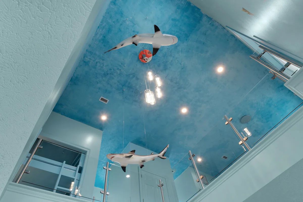 Aqua-1 Enjoyment assured! From swimming sharks to a glow in the dark pool deck, Aqua is sure to entertain.