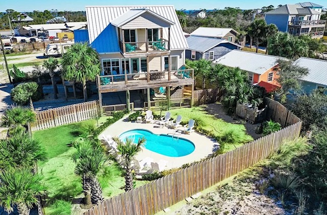 aerial view of home and pool