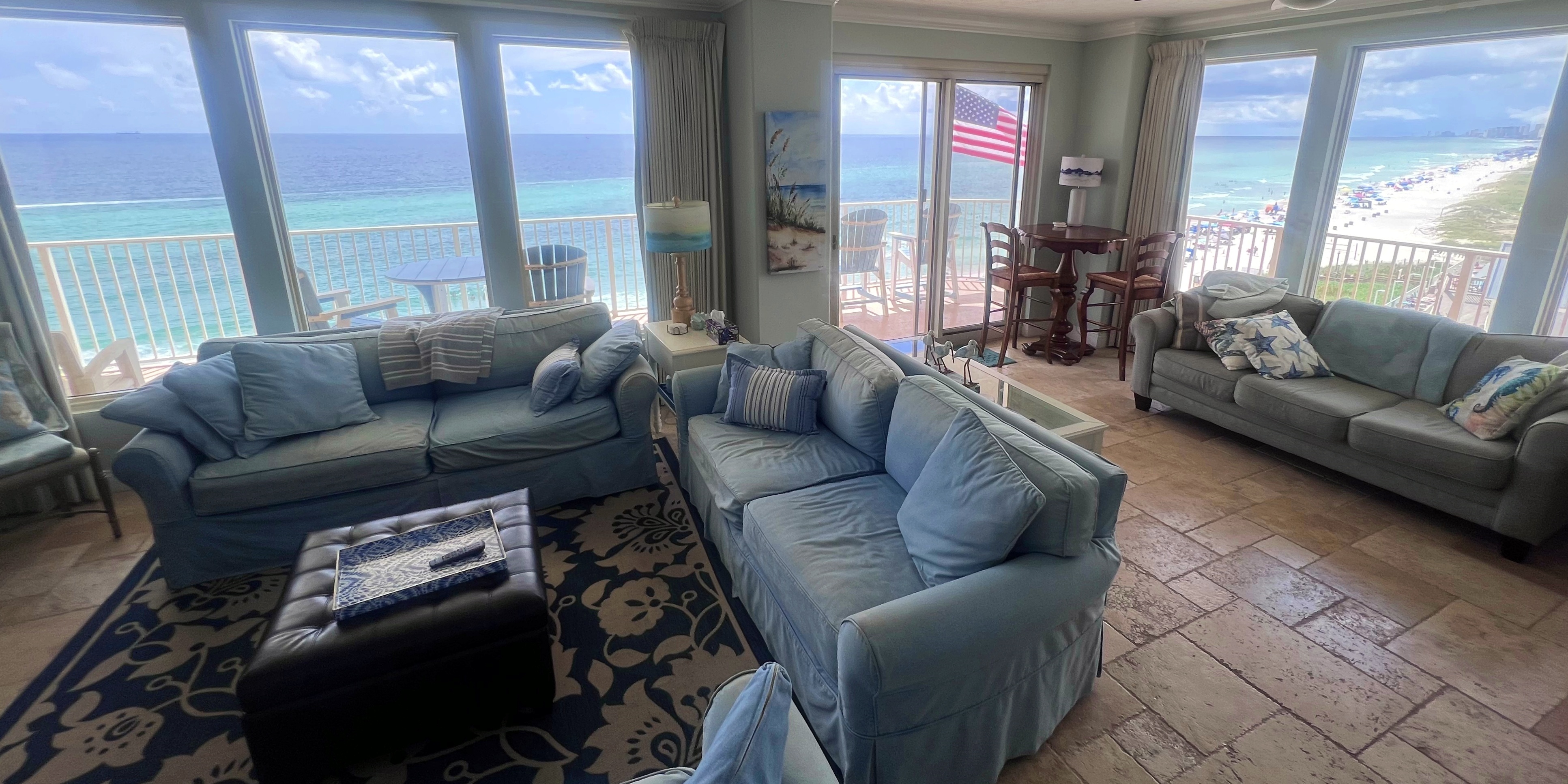 Living room with access to our wrap around balcony &amp; view of Gulf &amp; beach