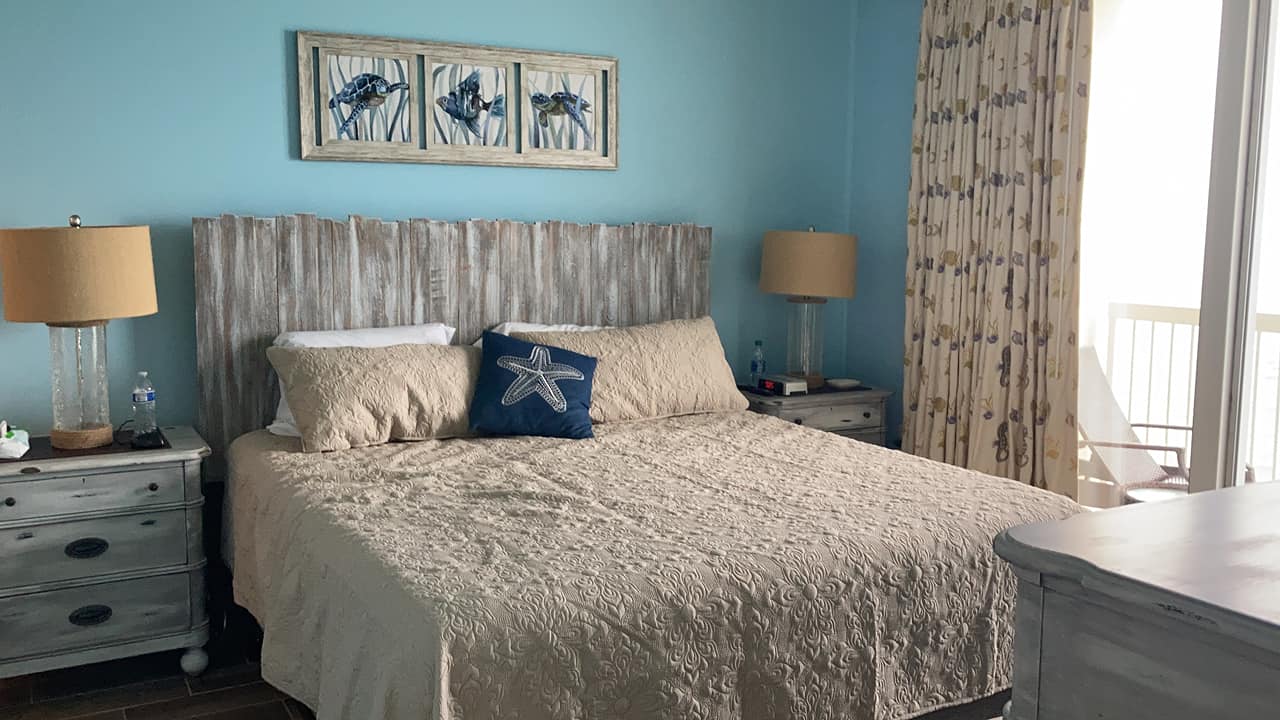 Quiet beach facing master bedroom with NEW BED/FRAME!!!