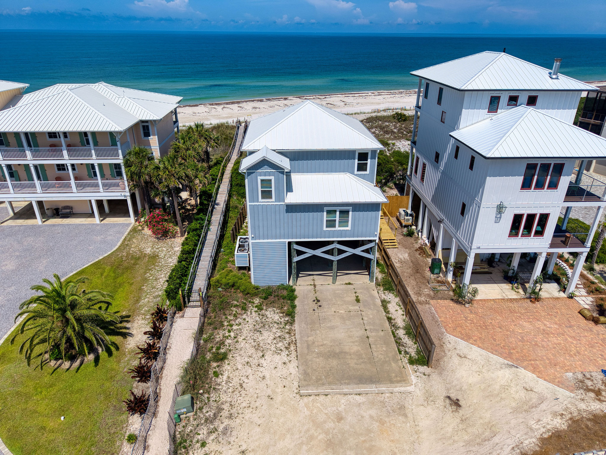 Gulf-front 4 bed / 3.5 bath with private boardwalk and parking for 4 vehicles