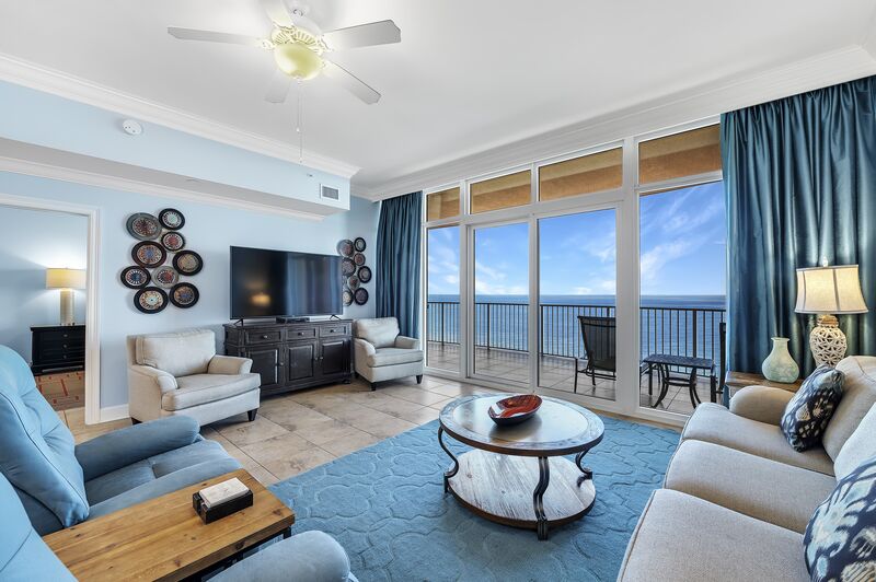 Large Living Area with 2 Large Recliner Chairs, a Queen Size Sleeper Sofa and access to the Private Balcony