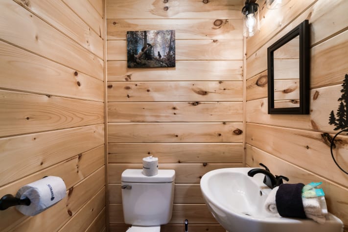 A second half bath on the second floor adds extra convenience for the group. Sevierville, Tennessee Cabin Rental - Gallery Image #31
