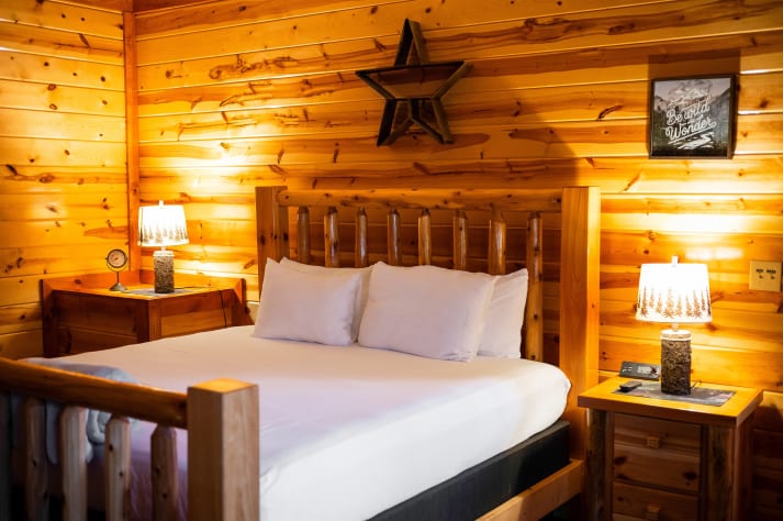 Bedroom 1 with TV and full bathroom Pigeon Forge, Tennessee Cabin Rental - Gallery Image #8