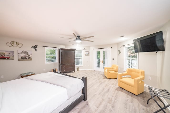 Master bedroom with TV and space Sevierville, Tennessee Cabin Rental - Gallery Image #34