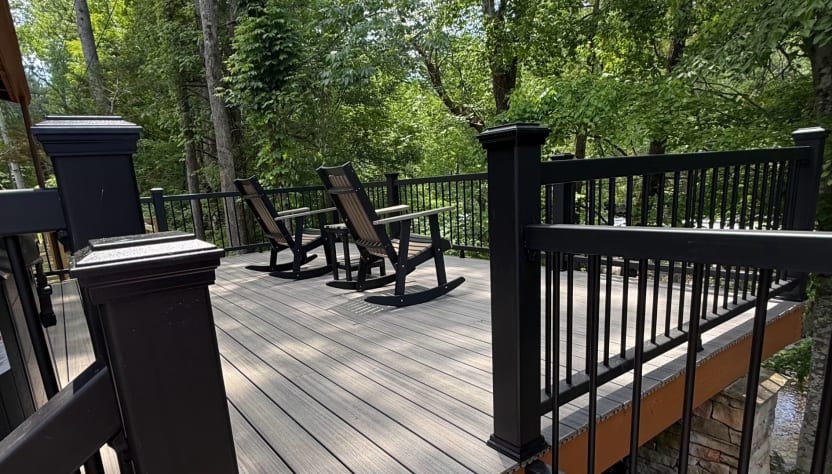 View of the back deck, and if you look closely, you can see the river at the bottom… Townsend, Tennessee Cabin Rental - Gallery Image #16
