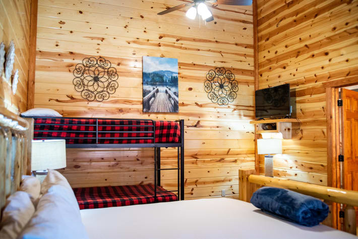 Bedroom 3: King bed with twin bunks and full bath and TV Pigeon Forge, Tennessee Cabin Rental - Gallery Image #25
