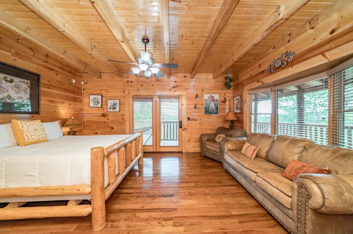 Couch area in bedroom 1 Pigeon Forge, Tennessee Cabin Rental - Gallery Image #26
