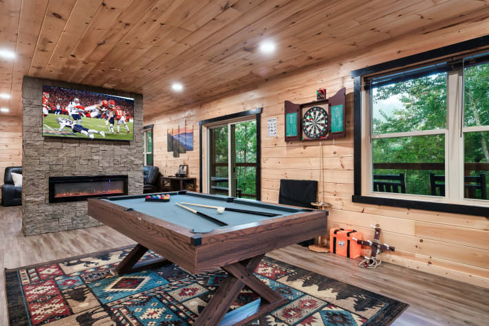 Pool table, darts, karaoke, and more — a rainy day at Stay Wild is never a wasted… Sevierville, Tennessee Cabin Rental - Gallery Image #6